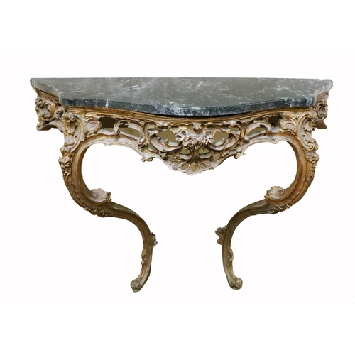 766 - A 19th Century French giltwood Console Table, the serpentine top with black marble with pierced deco... 