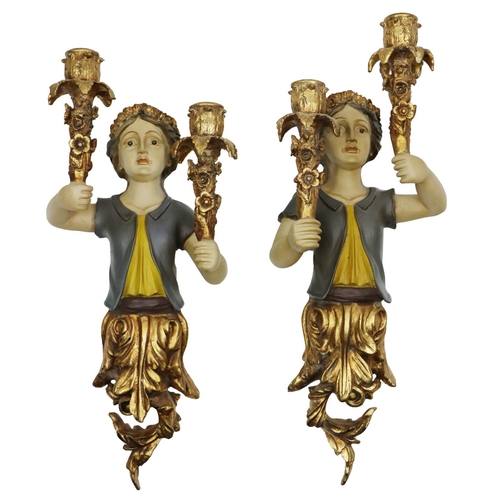 778 - A pair of attractive carved giltwood and painted figural two branch Wall Lights, each approx. 51cms ... 