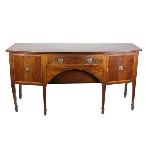 787 - A Georgian period mahogany bow fronted Sideboard, the plain top over central frieze drawer and satin... 