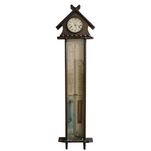 798 - A 19th Century oak cased 'Admiral Fitzroy Barometer,' the top with arched pediment and inset cl... 