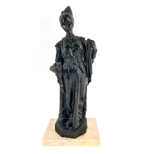 837 - A late 19th Century bronze Figure, of a Medieval Lady wearing a long dress, a bead necklace and a lo... 