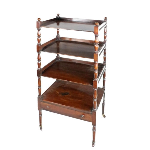 806 - An early Victorian mahogany four tier Whatnot, with three-quarter gallery on top, with knopped balus... 