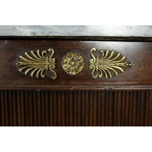 843 - A very fine pair of Regency mahogany Side Cabinets, applied with gilt metal mounts, each with an ass... 