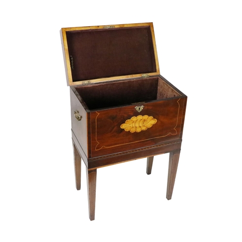 845 - A 19th Century mahogany lift top Cellaret, the hinged top with shaped string and Greek key inlay and... 