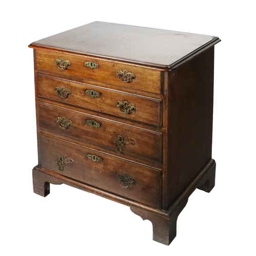 854 - An 18th Century mahogany Chest of drawers, of small proportions with moulded rim, the lift up top ab... 