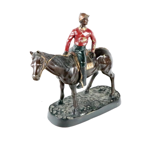 857 - An attractive bronze Model, of horse with jockey on board, painted, approx. 39cms high (15 1/2