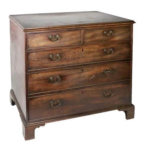 868 - A Georgian mahogany Chest, the moulded top over two short and three long graduating drawers with bra... 