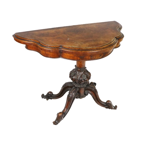 889 - A Victorian mahogany fold-over top Tea Table, of lobed  outlined with moulded rim, plain frieze... 