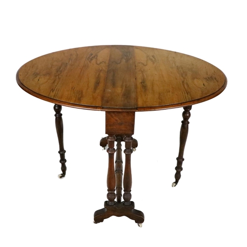 892 - A Victorian walnut Yacht Table, with D shaped flaps on turned pillars united by conforming stretcher... 