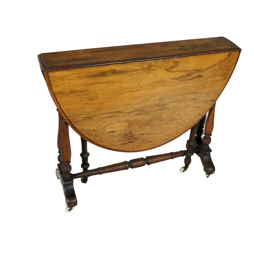 892 - A Victorian walnut Yacht Table, with D shaped flaps on turned pillars united by conforming stretcher... 