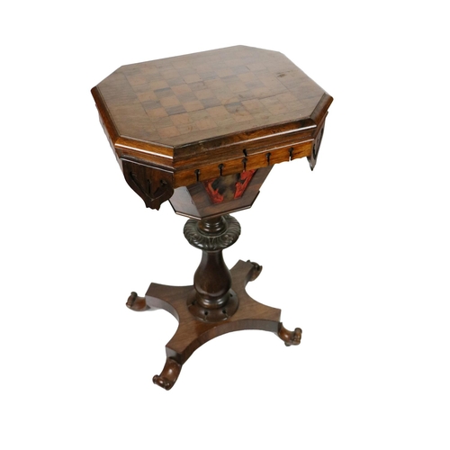 913 - A Victorian rosewood Ladies Work and Games Table, the octagonal lift top with inset games board open... 