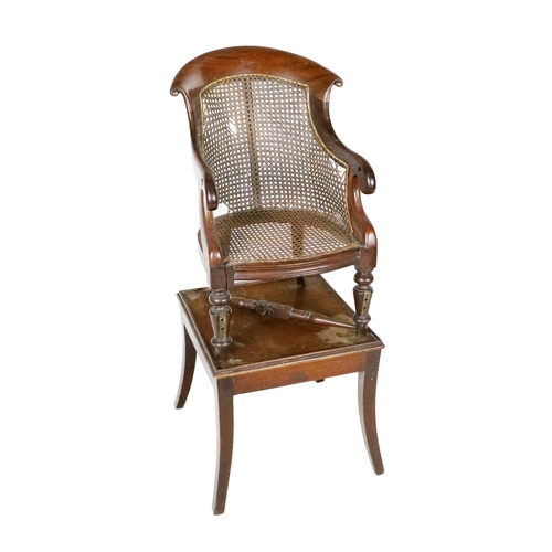 928 - A Victorian mahogany Childs Feeding Chair, the shaped seat with canework back and base on front turn... 