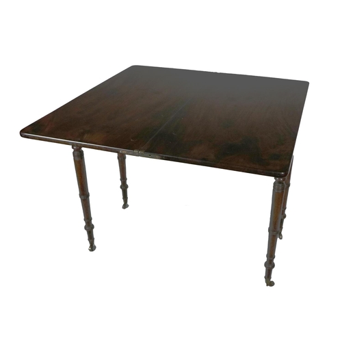 930 - A George IV mahogany fold-over top Tea Table, with rounded corners on ring turned legs, approx. 96cm... 