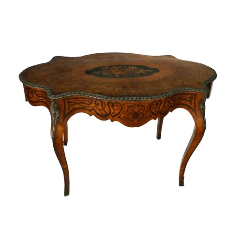 936 - A Victorian rosewood, kingwood and marquetry inlaid Centre Table, of shaped outline, gilt brass egg ... 