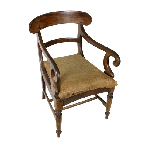 943 - A 19th Century mahogany Library Carver Armchair, with shaped bar back with scroll arms above a drop ... 