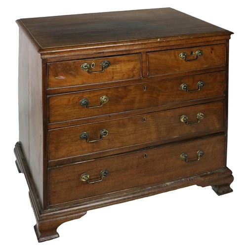 949 - A Georgian period mahogany Chest, the moulded top over two short and three long graduating drawers w... 