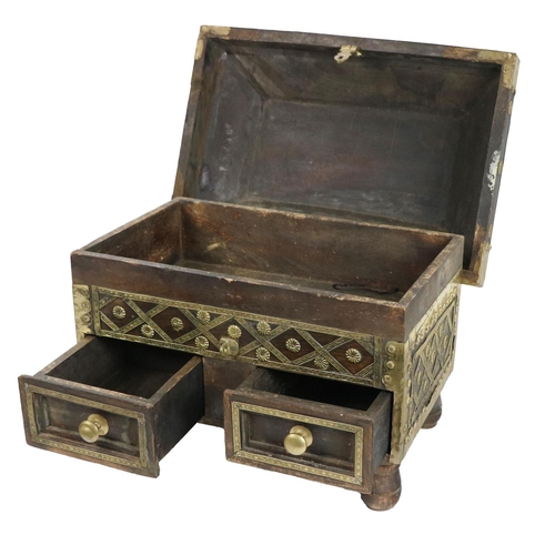 1004 - A Vintage Indian wooden Box, of sarcophagus shape, the hinged lid with ornate brass studs and band o... 