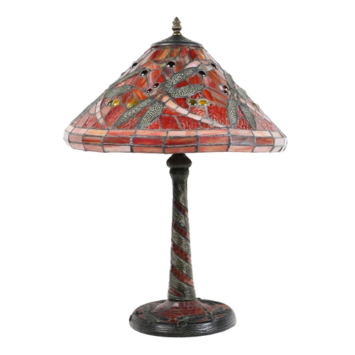 1014 - A Tiffany style Dragonfly Table Lamp, the glass shade of red colour with flying insect design, on a ... 