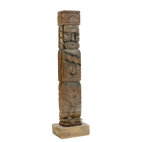 989 - A 19th Century carved wooden Native American Candlestick, moulded as a totem pole. (1)... 