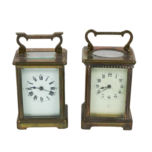 992 - A 19th Century brass Carriage Clock, with hinged carrying handle, enamel dial with Arabic numerals b... 