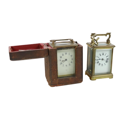 992 - A 19th Century brass Carriage Clock, with hinged carrying handle, enamel dial with Arabic numerals b... 