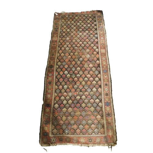 436 - A semi-antique Middle Eastern woollen Runner, the centre panel on navy ground with multiple stylized... 