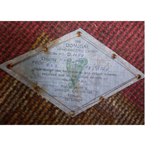 445 - A large and  impressive 20th Century Donegal woollen Carpet, (with label) in the French style, the o... 