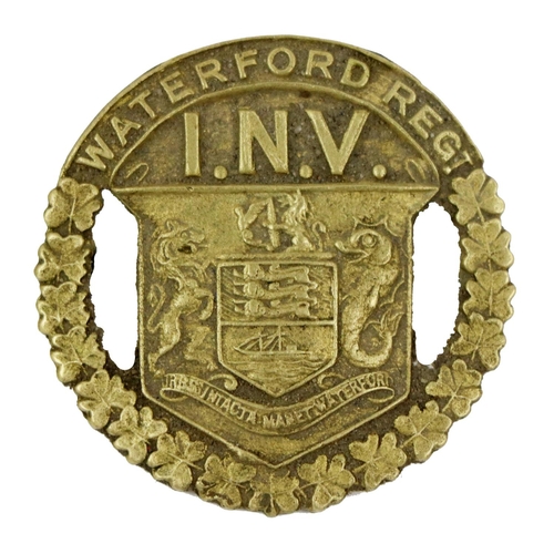 490 - Military Interest: (Co. Waterford) An original brass Cap Badge, c. 1913, the obverse inscribed 'Wate... 