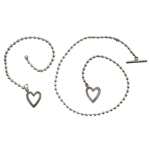 1121 - Jewellery: A Gucci silver bead Necklace, with T bar and love heart design link, both stamped and hal... 