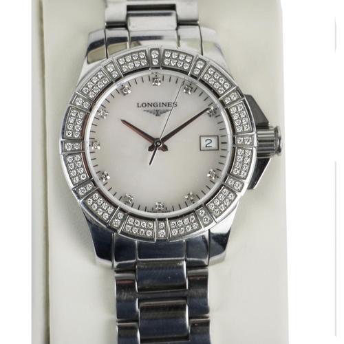 1127 - A Ladies Longines Wrist Watch, the mother-o-pearl face with diamonds on each point, inside a diamond... 