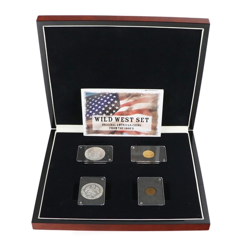 1179 - Coins: Dublin Mint Office, Wild West Set, a cased group of four original American Coins from the 180... 