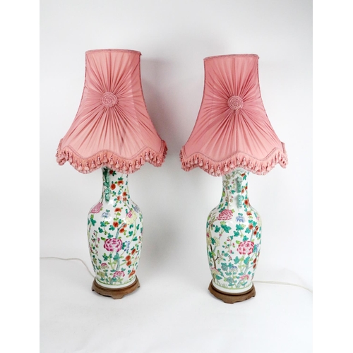 24 - A good pair of large modern Cantonese style Chinese porcelain Table Lamps, each with two double Foo ... 