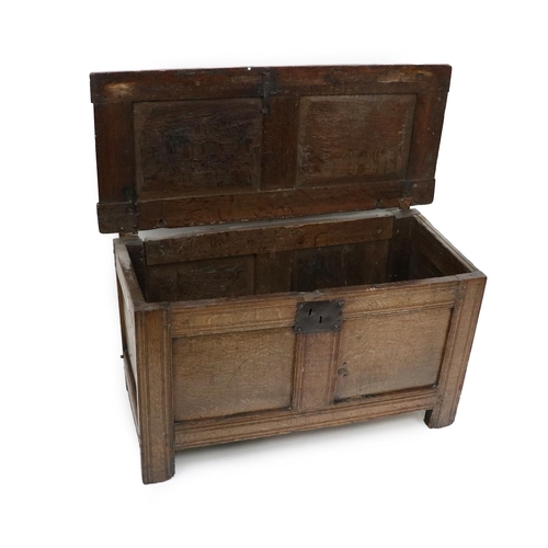 158 - A 17th Century style oak lift top Coffer Chest, with double panel lift top and double panel front, o... 