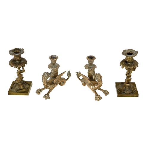 222 - A pair of heavy Regency period cast brass 'dolphin' Candlesticks, 20cms (8