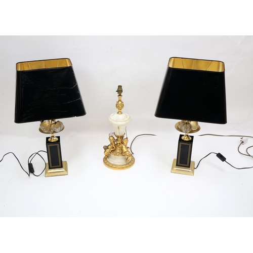 297 - A heavy ormolu and marble cherub decorated urn shaped Table Lamp; together with a pair of modern Emp... 