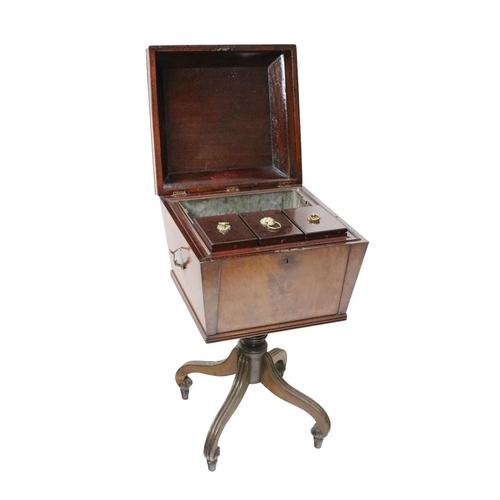 342 - A Regency period mahogany Teapoy, the casket shaped top opening to reveal a fitted interior with thr... 