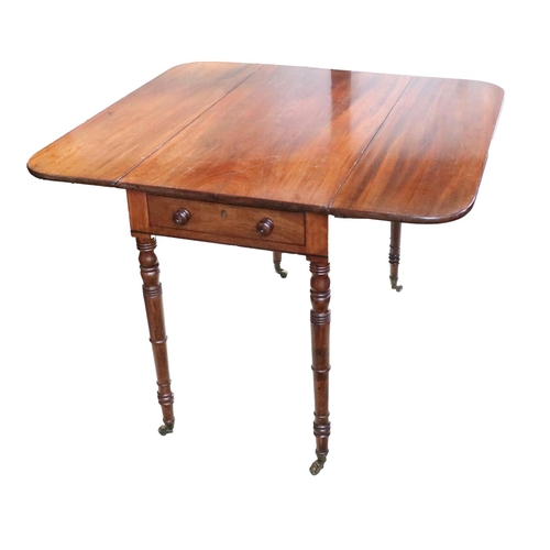 398 - A George IV period mahogany Pembroke Table, with D shaped flaps, flanking a frieze drawer on four ri... 