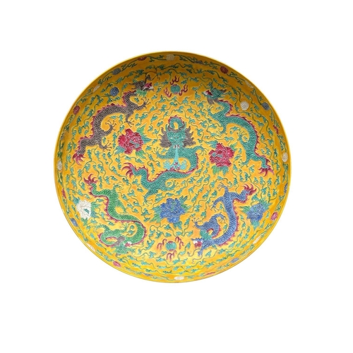 410 - A fine early Chinese Imperial yellow porcelain Dish, with raised enamel features depicting five drag... 