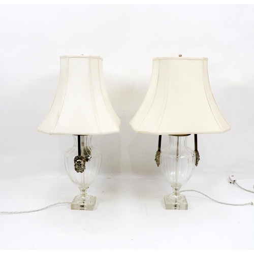 513 - A pair of modern Amphora style aluminum and glass vase shaped Table Lamps, with mask handles on squa... 