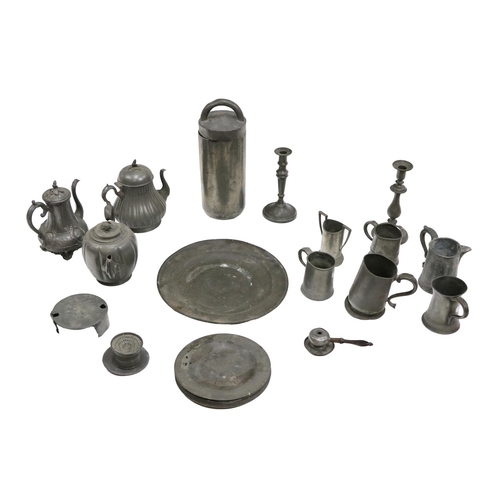 527 - A large quantity of Pewter, comprising of plates, jugs, candlesticks, teapots, as a lot, w.a.f. (1)... 