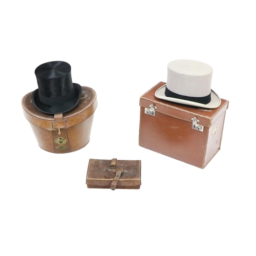 552 - A good black Top Hat, by Woodrow Dublin, Belfast, Manchester, Glasgow, Liverpool, in fitted leather ... 