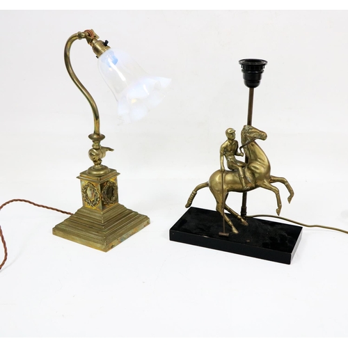 554 - A brass Table Lamp, modelled as a Polo Player on horseback, on an ebonised plinth base; together wit... 