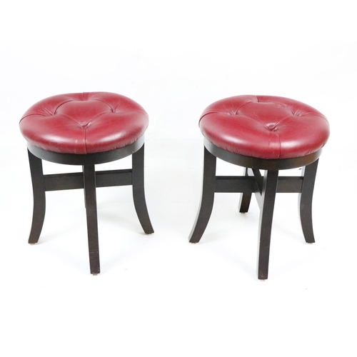 560 - A set of ten modern low Pub Stools, with deep button seats with turned legs. (10)