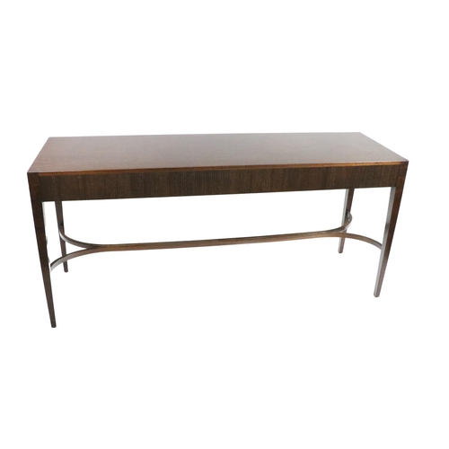 580 - An Italian oblong modern designer mahogany Side Table, with reeded front frieze on four square taper... 