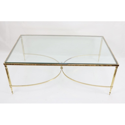 590 - An Italian modern glass top gilt metal framed Coffee Table, on tubular tapering legs, united by C st... 