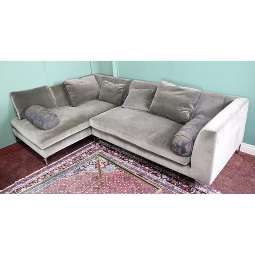 592 - A modern designer L shaped or Corner Couch, covered in grey velvet fabric, on chrome legs, approx. 2... 