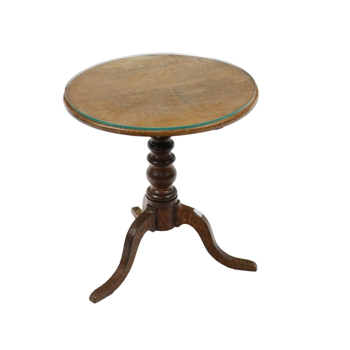 614 - A 19th Century oak tripod Occasional Table, with circular tilt top, 20