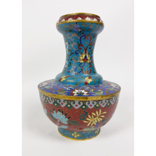 711 - A 19th Century attractive tubular shaped Chinese cloisonné Vase, of typical colourful floral design,... 