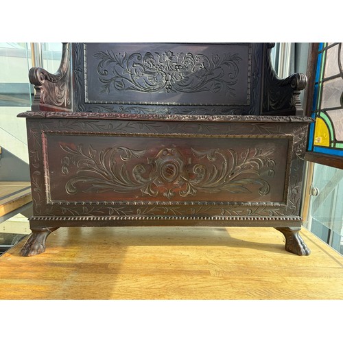 706 - A fine quality Edwardian carved mahogany Monks Bench, of small proportions, by Edwards and Roberts (... 