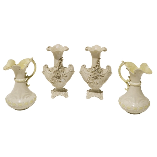 835 - A pair of flower encrusted boat shaped Second Period Belleek Vases, 27cms (10 1/2